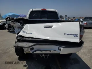 2014 Toyota Tacoma PreRunner with VIN 3TMKU4HN8EM041212, listed as a Copart auction lot 61948125 with 83,601 mi miles and Salvage title. Bid and sale history available at DreamBid. Image 6.