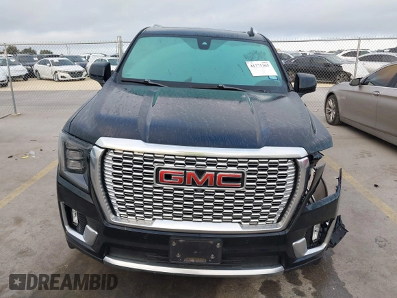 2021 GMC Yukon Denali with VIN 1GKS2DKL3MR308321, listed as a IAAI auction lot 41771365 with 63,415 mi miles. Bid and sale history available at carsss.com. Image 13.