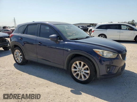 2013 Mazda CX-5 Grand Touring with VIN JM3KE2DE4D0147902, listed as a Copart auction lot 52696685 with 331,168 mi miles and Clean Title. Bid and sale history available at carsss.com. Image 4.