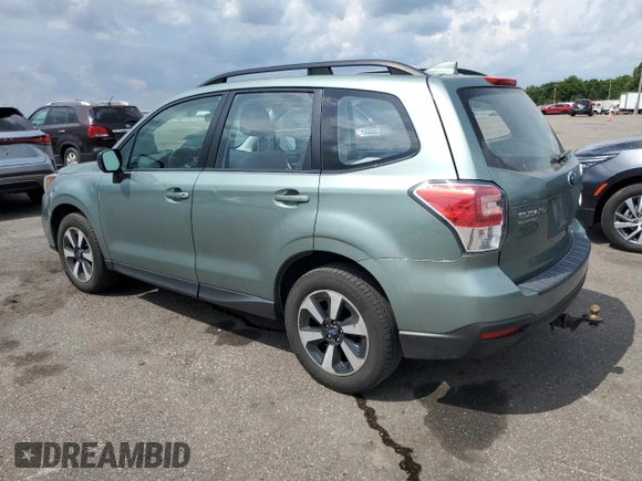 2018 Subaru Forester with VIN JF2SJABC1JH582343, listed as a Copart auction lot 61181195 with 82,904 mi miles and Salvage title. Bid and sale history available at DreamBid. Image 2.