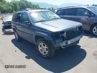 2001 Jeep Grand Cherokee Laredo with VIN 1J4GW48S91C644083, listed as a IAAI auction lot 42697504 with Not provided miles and . Bid and sale history available at DreamBid. Image 1.