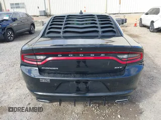 2018 Dodge Charger SXT Plus with VIN 2C3CDXHG1JH139311, listed as a IAAI auction lot 41758392 with 103,034 mi miles and . Bid and sale history available at carsss.com. Image 16.