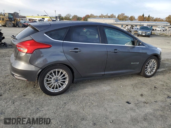 2015 Ford Focus Electric with VIN 1FADP3R43FL221870, listed as a Copart auction lot 79549284 with 67,079 mi miles and Salvage title. Bid and sale history available at DreamBid. Image 3.