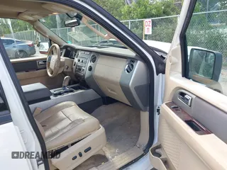2014 Ford Expedition King Ranch with VIN 1FMJU1J50EEF14445, listed as a IAAI auction lot 42571073 with 125,174 mi miles and . Bid and sale history available at DreamBid. Image 5.
