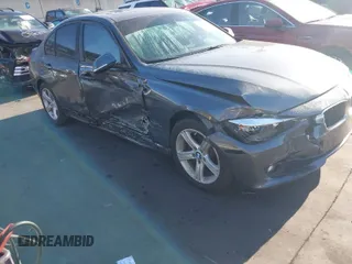 2015 BMW 3 Series 328i with VIN WBA3C1C59FK121850, listed as a IAAI auction lot 42004000 with 60,992 mi miles and . Bid and sale history available at carsss.com. Image 1.