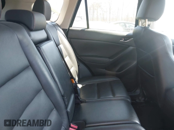 2014 Mazda CX-5 Grand Touring with VIN JM3KE4DY1E0339690, listed as a IAAI auction lot 41668780 with 216,825 mi miles. Bid and sale history available at carsss.com. Image 8.