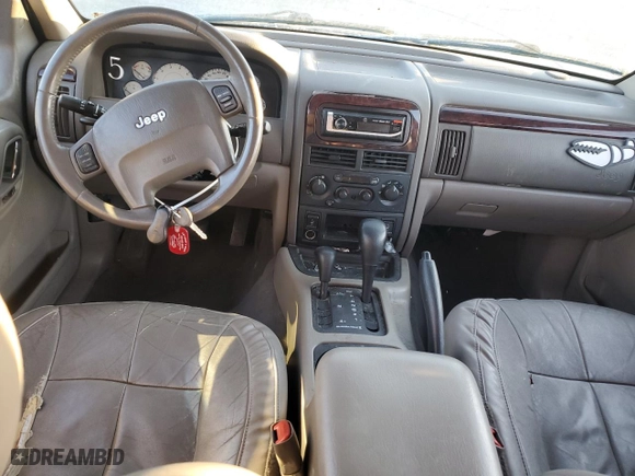 2003 Jeep Grand Cherokee Limited with VIN 1J4GW58N03C561385, listed as a Copart auction lot 75777094 with 169,705 mi miles and Salvage Title. Bid and sale history available at carsss.com. Image 8.