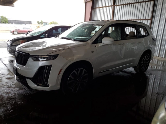2021 Cadillac XT6 AWD Sport z VIN 1GYKPHRSXMZ195978, wystawiony jako Copart lot #80886314 z przebiegiem Nie podano mil oraz Szkoda całkowita • Salvage title. Historia ofert i sprzedaży dostępna na DreamBid. Obrazek 1.