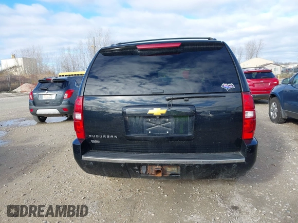 2014 Chevrolet Suburban LT with VIN 1GNSKJE71ER232700, listed as a IAAI auction lot 40812602 with 245,852 mi miles and . Bid and sale history available at DreamBid. Image 16.