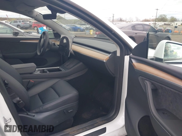 2023 Tesla Model Y Long Range with VIN 7SAYGDEE3PA201719, listed as a IAAI auction lot 42048816 with Not Provided miles and . Bid and sale history available at DreamBid. Image 5.