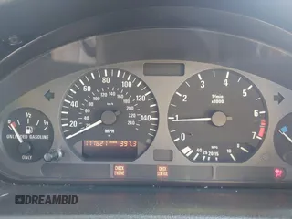 1997 BMW 3-Series 328IC with VIN WBABK8323VET99797, listed as a IAAI auction lot 41616423 with 177,621 mi miles. Bid and sale history available at carsss.com. Image 7.