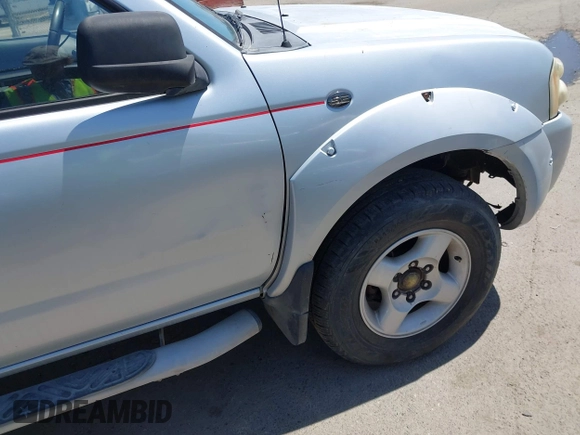 2001 Nissan Frontier SE Desert Runner z VIN 1N6ED26T51C362345, wystawiony jako IAAI lot #42324055 z przebiegiem 233 809 mil mil oraz . Historia ofert i sprzedaży dostępna na DreamBid. Obrazek 12.
