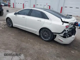 2013 Lincoln MKZ z VIN 3LN6L2GK9DR811737, wystawiony jako IAAI lot #42011896 z przebiegiem 100 669 mil mil oraz . Historia ofert i sprzedaży dostępna na DreamBid. Obrazek 3.