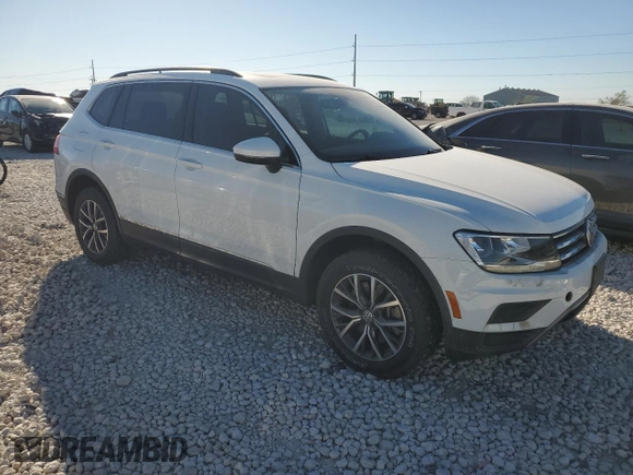 2020 Volkswagen Tiguan SE with VIN 3VV2B7AX4LM025185, listed as a Copart auction lot 48942445 with 82,550 mi miles and Salvage Title. Bid and sale history available at DreamBid. Image 4.