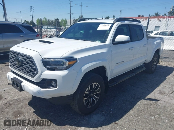 2023 Toyota Tacoma SR5 z VIN 3TMDZ5BN3PM160975, wystawiony jako IAAI lot #42024778 z przebiegiem 41 621 mil mil oraz . Historia ofert i sprzedaży dostępna na DreamBid. Obrazek 17.