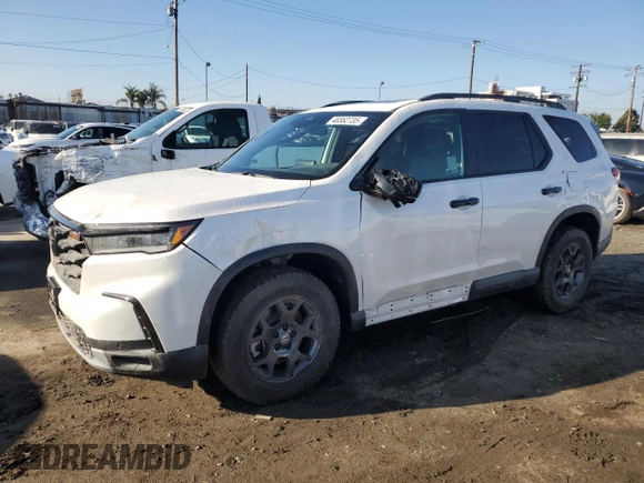 2025 Honda Pilot TrailSport with VIN 5FNYG1H65SB004479, listed as a Copart auction lot 48362735 with 7,582 mi miles and Salvage Title. Bid and sale history available at carsss.com. Image 1.