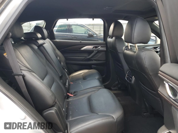 2016 Mazda CX-9 Grand Touring с VIN JM3TCADY2G0121026, выставлен на аукционе Copart как лот 60518105 с пробегом 104 923 миль миль и Списание • Salvage title. История ставок и продаж доступна на DreamBid. Изображение 10.
