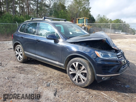 2017 Volkswagen Touareg Wolfsburg Edition z VIN WVGRF7BP6HD006748, wystawiony jako IAAI lot #41483215 z przebiegiem 97 816 mil mil oraz . Historia ofert i sprzedaży dostępna na DreamBid. Obrazek 1.