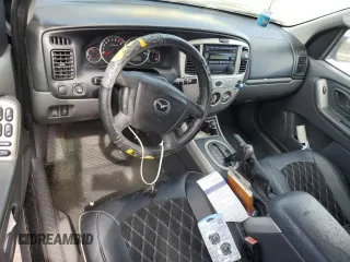 2005 Mazda Tribute i with VIN 4F2YZ02Z05KM51509, listed as a Copart auction lot 75985994 with Not Provided miles and Salvage Title. Bid and sale history available at carsss.com. Image 8.