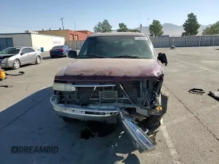 2000 Chevrolet Suburban LS with VIN 3GNEC16T2YG160819, listed as a Copart auction lot 77664344 with 200,816 mi miles and Salvage title. Bid and sale history available at DreamBid. Image 11.