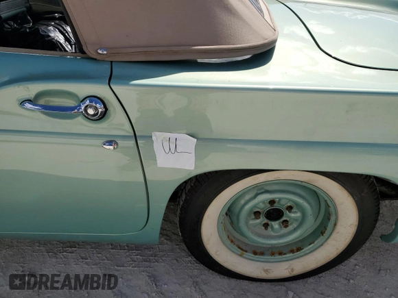 1957 Ford Thunderbird with VIN D7FH182410, listed as a Copart auction lot 77671374 with 319 mi miles and Salvage Title. Bid and sale history available at DreamBid. Image 12.
