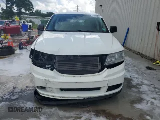 2014 Dodge Journey American Value with VIN 3C4PDCAB3ET216889, listed as a Copart auction lot 60874265 with 117,508 mi miles and Salvage title. Bid and sale history available at DreamBid. Image 5.
