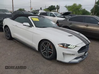2020 Ford Mustang EcoBoost z VIN 1FATP8UH4L5120002, wystawiony jako IAAI lot #41977618 z przebiegiem 63 570 mil mil oraz . Historia ofert i sprzedaży dostępna na DreamBid. Obrazek 1.
