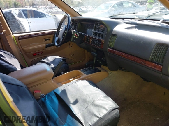 1997 Jeep Grand Cherokee Limited with VIN 1J4GZ78Y1VC658515, listed as a IAAI auction lot 41897266 with 164,033 mi miles and . Bid and sale history available at DreamBid. Image 5.