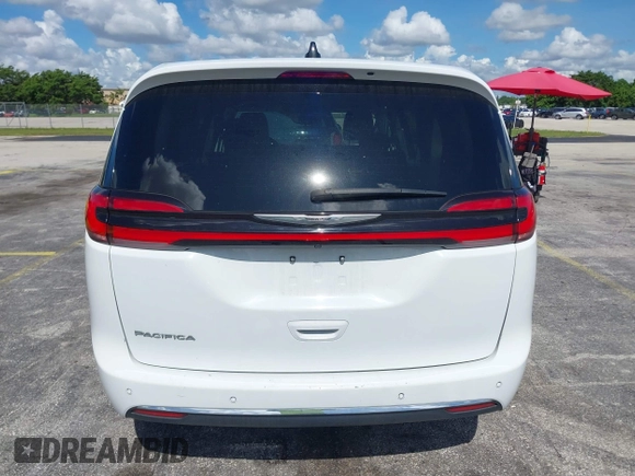 2023 Chrysler Pacifica Touring L z VIN 2C4RC1BG8PR566745, wystawiony jako IAAI lot #42579405 z przebiegiem 46 228 mil mil oraz . Historia ofert i sprzedaży dostępna na DreamBid. Obrazek 16.