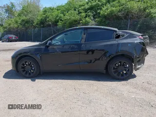 2023 Tesla Model Y Long Range with VIN 7SAYGDEE0PA111430, listed as a IAAI auction lot 42156924 with 35,950 mi miles and . Bid and sale history available at DreamBid. Image 15.