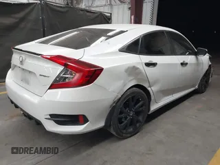 2019 Honda Civic Sport with VIN 19XFC2F86KE022749, listed as a IAAI auction lot 42127993 with 116,279 mi miles and . Bid and sale history available at DreamBid. Image 4.