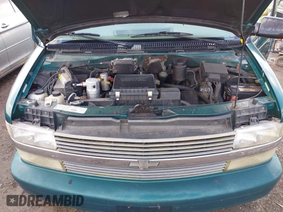 1999 Chevrolet Astro Cargo YF7 z VIN 1GBDM19W7XB184567, wystawiony jako IAAI lot #42422713 z przebiegiem 235 859 mil mil oraz . Historia ofert i sprzedaży dostępna na DreamBid. Obrazek 10.