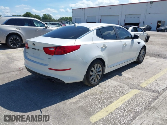 2015 Kia Optima LX z VIN KNAGM4A78F5614728, wystawiony jako IAAI lot #42494773 z przebiegiem 106 752 mil mil oraz . Historia ofert i sprzedaży dostępna na DreamBid. Obrazek 4.