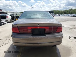 2003 Buick Regal LS z VIN 2G4WB52K731166956, wystawiony jako Copart lot #54233005 z przebiegiem 192 207 mil mil oraz Nie do naprawy • Non repairable. Historia ofert i sprzedaży dostępna na DreamBid. Obrazek 6.