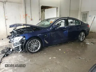 2018 BMW 5 Series 530e with VIN WBAJA9C57JB033612, listed as a Copart auction lot 61150485 with 97,687 mi miles and Salvage title. Bid and sale history available at DreamBid. Image 1.