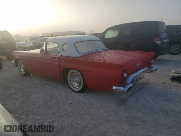 1957 Ford Thunderbird with VIN D7FH286272, listed as a Copart auction lot 77243694 with 19,878 mi miles and Salvage Title. Bid and sale history available at DreamBid. Image 2.
