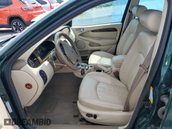 2003 Jaguar X-Type 2.5L Manual z VIN SAJEA51D63XD54591, wystawiony jako Copart lot #57638355 z przebiegiem 93 905 mil mil oraz Szkoda całkowita • Salvage title. Historia ofert i sprzedaży dostępna na DreamBid. Obrazek 7.