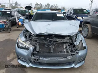 2015 Infiniti Q50 Premium with VIN JN1BV7AP1FM351633, listed as a IAAI auction lot 41880366 with 106,564 mi miles. Bid and sale history available at carsss.com. Image 13.