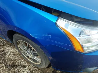 2010 Ford Focus SE with VIN 1FAHP3FNXAW159048, listed as a IAAI auction lot 42103062 with 142,810 mi miles. Bid and sale history available at carsss.com. Image 18.