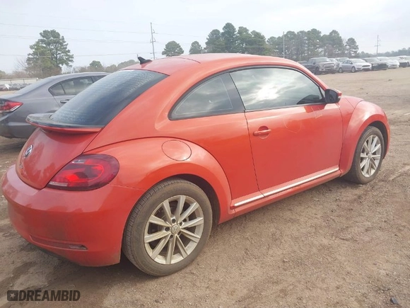 2018 Volkswagen Beetle S with VIN 3VWFD7AT0JM711483, listed as a IAAI auction lot 41506394 with 100,321 mi miles. Bid and sale history available at carsss.com. Image 4.