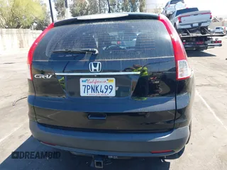 2014 Honda CR-V LX with VIN 3CZRM3H36EG704499, listed as a IAAI auction lot 41966876 with 74,054 mi miles. Bid and sale history available at carsss.com. Image 17.