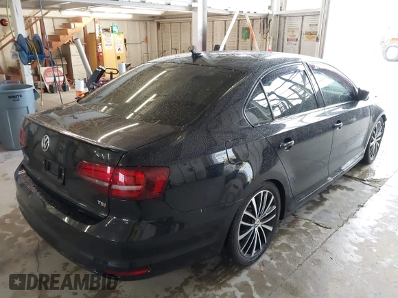 2016 Volkswagen Jetta Sport z VIN 3VWD17AJ0GM283938, wystawiony jako IAAI lot #41861923 z przebiegiem 118 418 mil mil oraz . Historia ofert i sprzedaży dostępna na DreamBid. Obrazek 4.