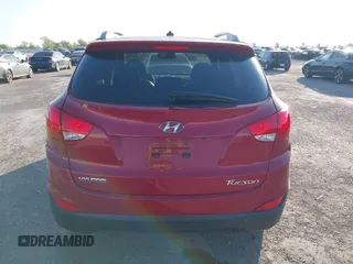 2013 Hyundai Tucson GLS with VIN KM8JU3AC6DU763590, listed as a IAAI auction lot 41999555 with 149,960 mi miles. Bid and sale history available at carsss.com. Image 16.