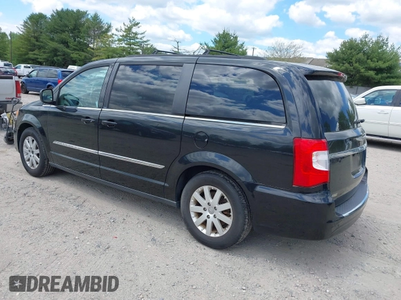 2014 Chrysler Town & Country Touring with VIN 2C4RC1BG2ER206979, listed as a IAAI auction lot 42200266 with 217,610 mi miles and . Bid and sale history available at DreamBid. Image 3.