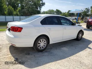 2014 Volkswagen Jetta S with VIN 3VW2K7AJXEM415024, listed as a Copart auction lot 61578155 with 115,041 mi miles and Salvage title. Bid and sale history available at DreamBid. Image 3.