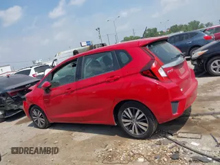 2015 Honda Fit EX-L z VIN 3HGGK5H86FM719146, wystawiony jako IAAI lot #42276633 z przebiegiem 155 515 mil mil oraz . Historia ofert i sprzedaży dostępna na DreamBid. Obrazek 14.