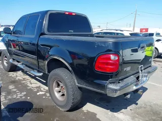2003 Ford F-150 XLT with VIN 1FTRW07L33KA64046, listed as a IAAI auction lot 41754147 with Not Provided miles. Bid and sale history available at carsss.com. Image 3.