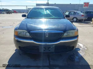 2000 Lincoln LS with VIN 1LNHM86S4YY818127, listed as a IAAI auction lot 41329978 with 158,134 mi miles. Bid and sale history available at carsss.com. Image 13.