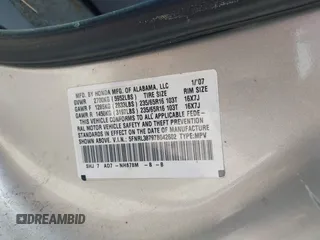 2007 Honda Odyssey EX-L z VIN 5FNRL38797B042602, wystawiony jako IAAI lot #42300656 z przebiegiem 250 000 mil mil oraz . Historia ofert i sprzedaży dostępna na DreamBid. Obrazek 9.
