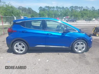 2020 Chevrolet Bolt EV LT z VIN 1G1FY6S04L4133689, wystawiony jako IAAI lot #42116747 z przebiegiem 29 150 mil mil oraz . Historia ofert i sprzedaży dostępna na DreamBid. Obrazek 14.